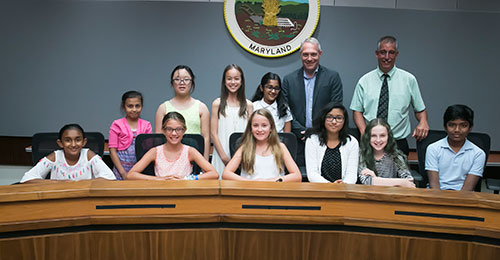 Student group photo at meeting.