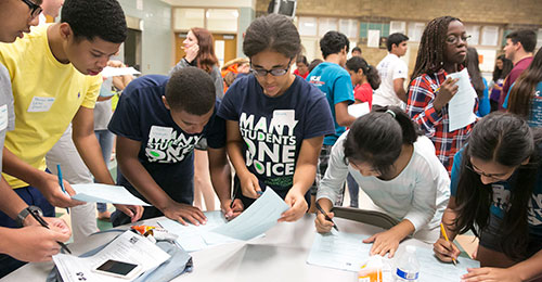 HCASC students gather at a table