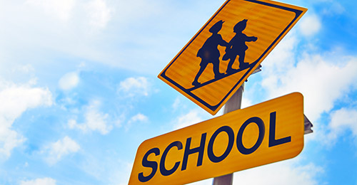 Yellow school safety sign.