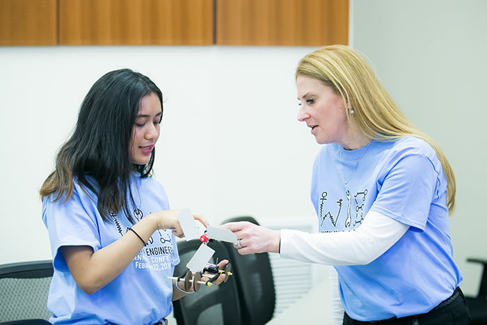 Stephanie Discepolo working with a female engineering student