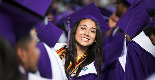 Smiling female graduate.