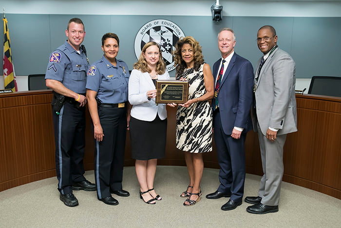 HCPSS representatives with SROs from Atholton High School.