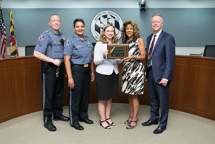 HCPSS representatives with SROs from Hammond High School..