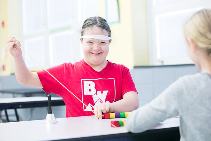 An ALS student involved in FQMS' Falcon Lunch Buddies program.