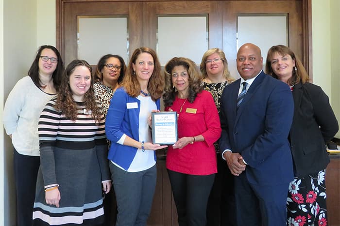 HCPSS and NAMI staff at the partnership signing.