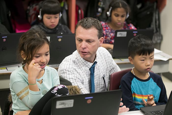 David Floyd working with students.