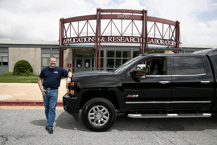 Tom Dearstine stands in front of his truck at ARL.