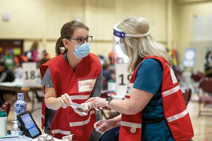 Kerrie Wagaman and a nurse at a clinic.