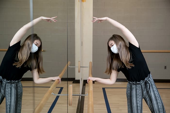 Kerry Johnson dancing at the barre.