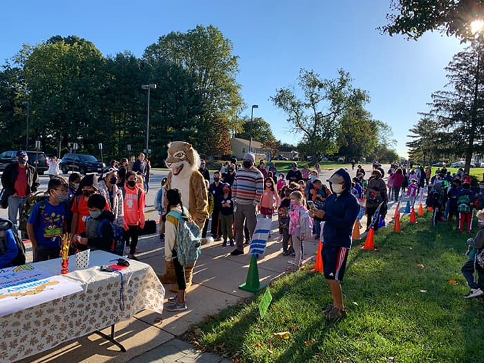 WOES students walking to school during Kindness Week.