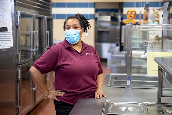 Folly Quarter MS Cafeteria Manager Dahlia Minor in the lunch line.