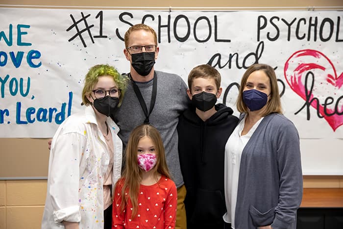 HHES school psychologist Jeff Leard with his wife and three children.
