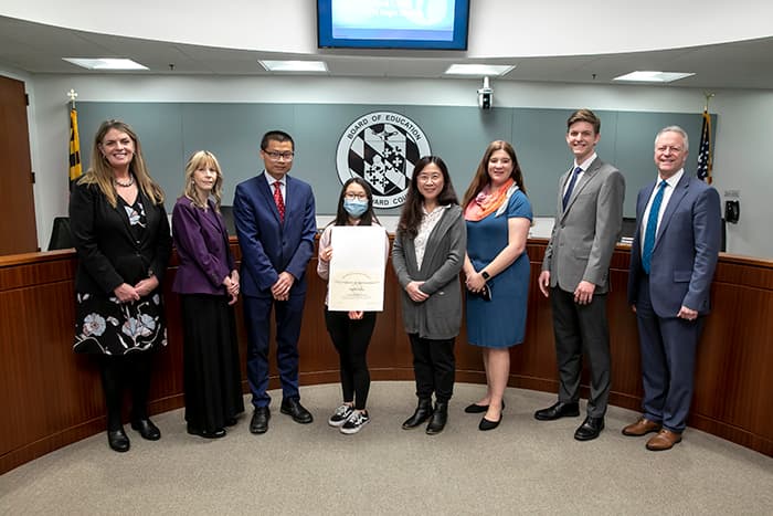 Board of Education members and the Superintendent recognize Amanda Wang as a Friends of Education Award nominee.