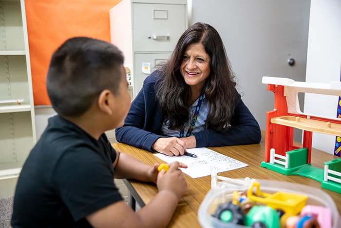 Caramen Alverio meets with a male student.