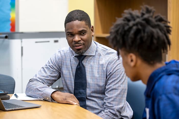 HCPSS social worker Jean Audain meets with a student.