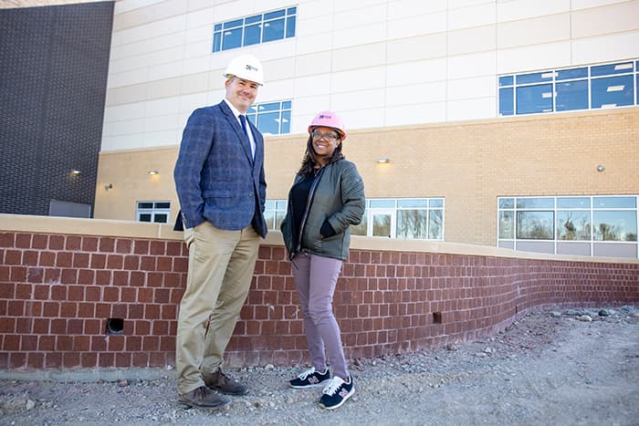 Josh Wasilewski and HS#13 Assistant Principal Adrienne Williamsstanding on site of new HS#13.