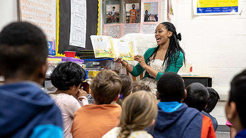 Dr. Laura Moore reads out loud to her students at Waverly Elementary School