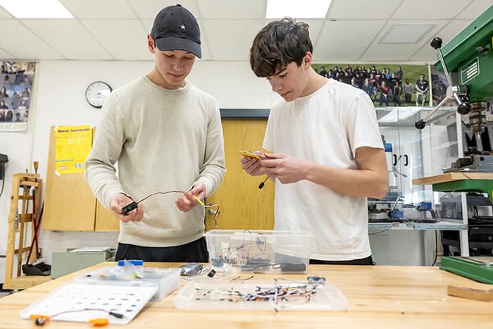 Two MHHS students working on their Samsung STEM contest submission