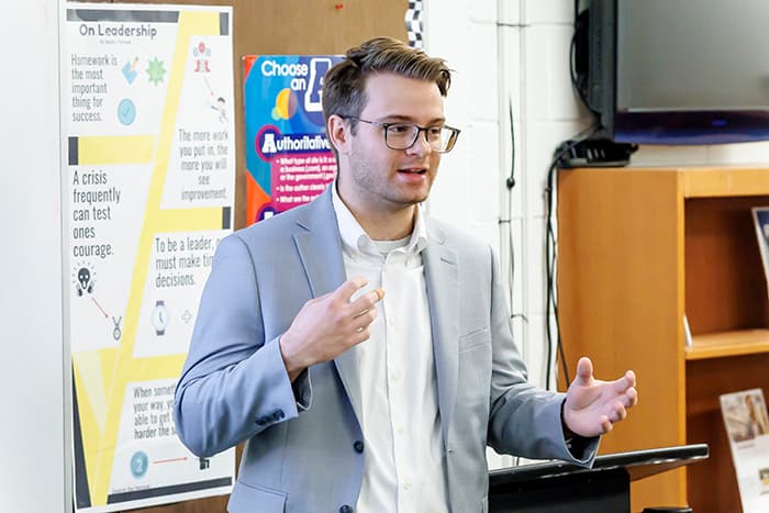 An FBI agent speaks to students in the Early College Cybersecurity Program.