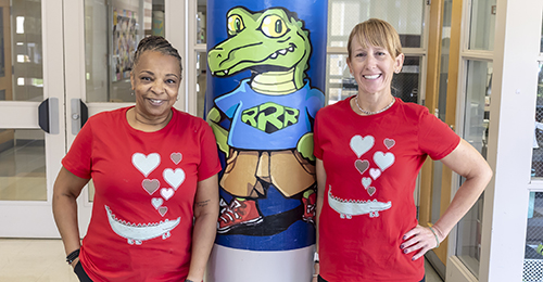 Two Gorman Crossing Elementary School staff posing for photo