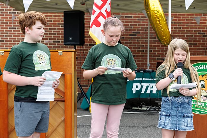 Third graders presented a talking timeline from the 1920s to present day.