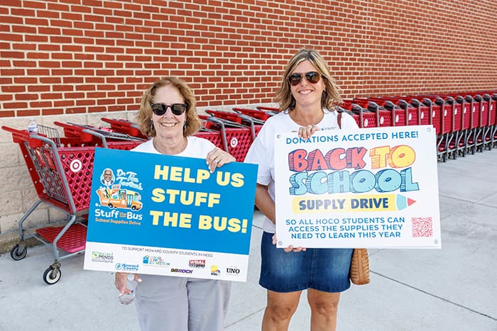 Susan Appletree and Kim Hurst at the 2025 Stuff the Bus event.