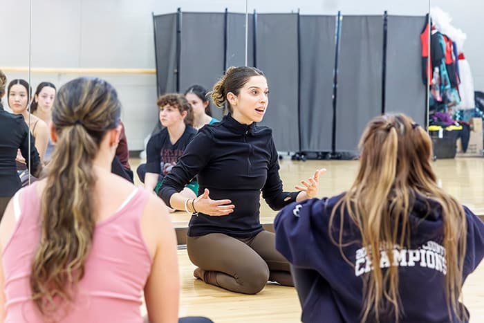 Haley Nachlas leading a dance class.