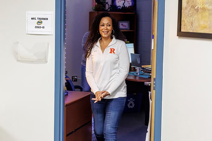 Stephanie Thurmon walking out of her office, smiling.