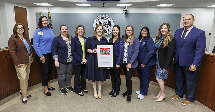 Jen Mallo, Bill Barnes and HCMC staff.