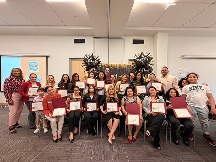 HCPSS staff and 2026 graduates of the Academia de Padres.
